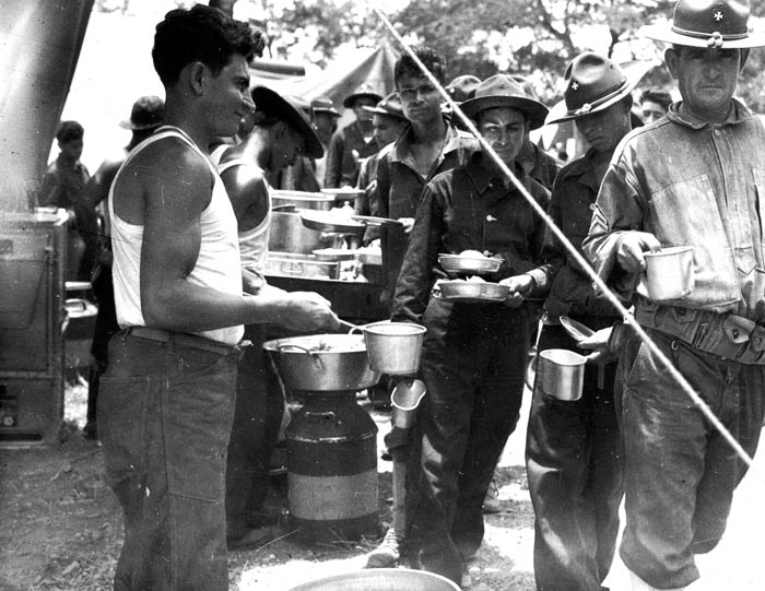 Forming of Chow Line at 65th Infantry at Salinas's maneuvers, Puerto Rico. 1941.  SC 121825